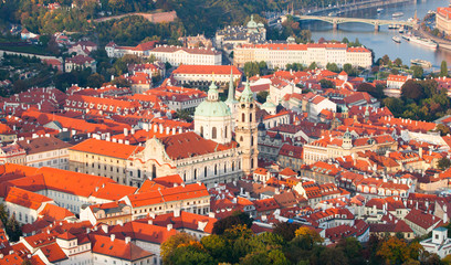 Fototapeta na wymiar Aerial view of the Lesser Town, aka Mala Strana, with St Nicholas Church in Prague, capital city of Czech Republic, Europe. UNESCO World Heritage Site