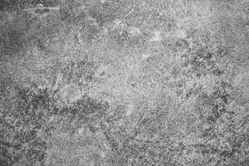 Grunge gray concrete wall surface.