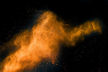 Launched colorful powder, isolated on black background