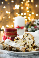 Christmas stollen. Traditional German Christmas dessert on wooden background
