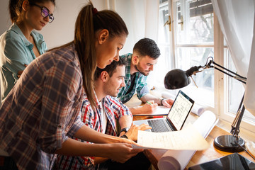 Group of young business people and designers.They working on new project.Startup concept.