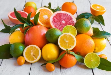 Abwaschbare Fototapete Früchte Verschiedene Zitrusfrüchte (Orange, Grapeftuit, Zitrone, Mandarine, Limette)