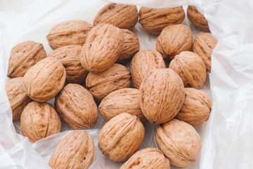 Fresh organic walnuts in plastic bag