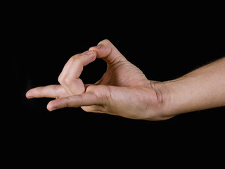 Close-up of a hand, practicing yoga. Apan mudra