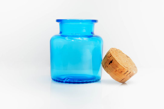 Blue Glass Jar With Wooden Lid Isolate On White Background