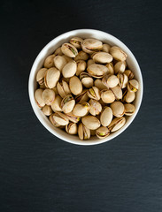 pistachio on dark background