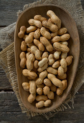 peanuts on wooden surface