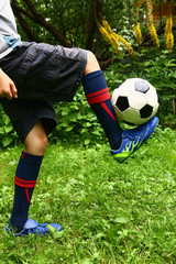 Fototapeta premium football player foot with ball