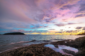 Fototapeta na wymiar Beautiful landscape with colorful sunset on the sea.