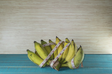 fruit with the tape measure shows the weight control.it take