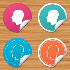 Round stickers or website banners. Head icons. Male and female human sign symbols. Circle badges with bended corner. Vector