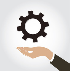 hand holding gear icon vector