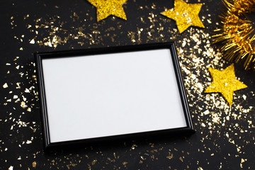 New year mock up, poster, photo frame, golden star, glitter, black background