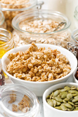 Obraz na płótnie Canvas fresh ingredients for healthy breakfast, vertical closeup
