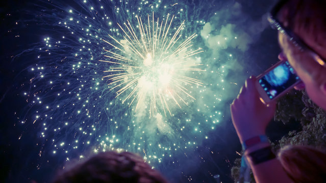Woman enjoying fireworks celebration