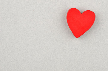 Heart on cardboard background