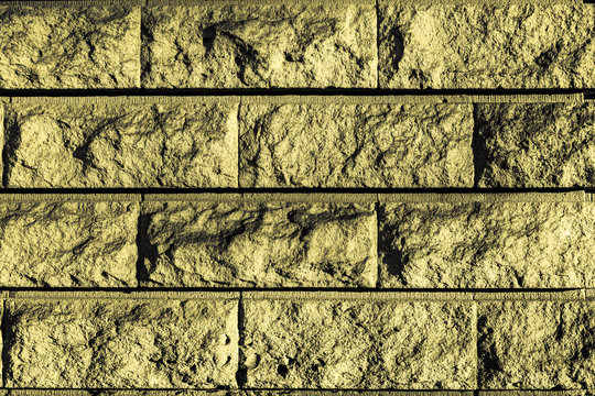 Perfect yellow yellowish greyscale stone brick wall close up