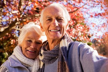 Senior couple taking a selfie