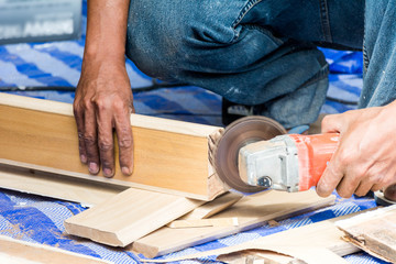 People cut wooden. home repairs