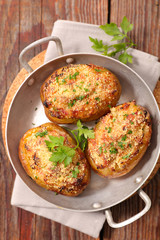 baked potato with bacon and cheese