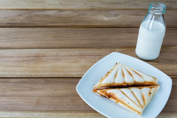 Bread and milk for breakfast or morning time