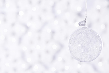 Beautiful shiny ball on a winter background