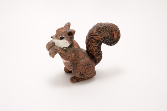 beautiful brown squirrel toy isolated on white background