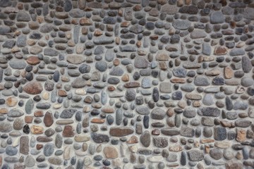 A picturesque mosaic pebble stone wall mosaic.
