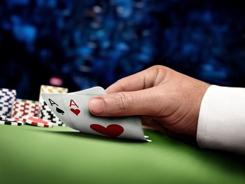 online poker player at casino table