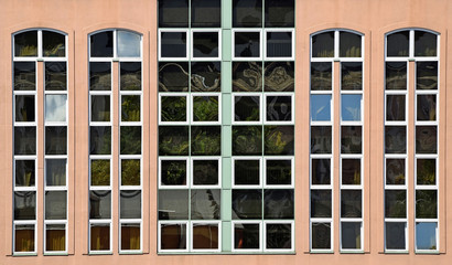 Fototapeta na wymiar Windows of a new office building