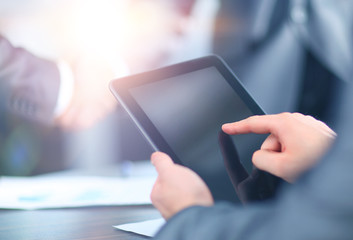 Businessman holding digital tablet