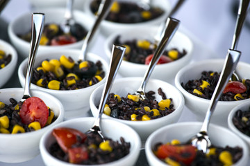 Black rice salad with maize and tomato