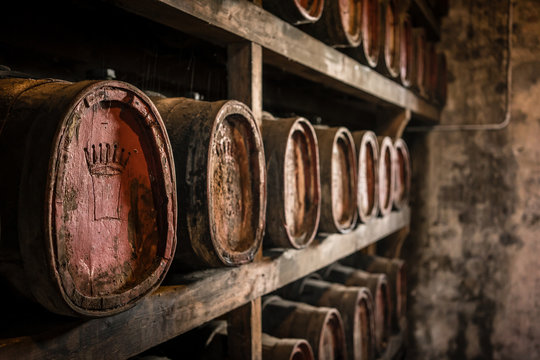 Vin santo dessert wine oak barrels aging in wine cellar