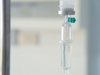 Saline intravenous (iv) drip in hospital. Health care and Medical equipment concept.