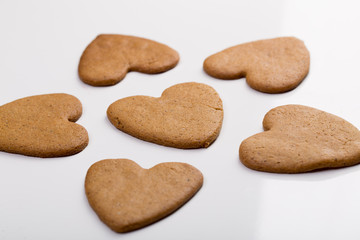 Fototapeta na wymiar christmas gingerbread cookie in the form of hearts. Valentine's Day concept
