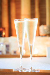 Two glasses of champagne near jacuzzi. Valentines background. Ro