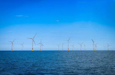 Fototapeta premium Offshore Wind Turbine in a Wind farm under construction off the coast of England.