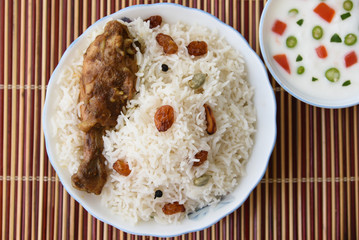 chicken biryani or biriyani made of basmati rice. hot spicy food very popular in Hyderabad India