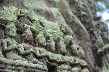 Ancient Apsara Dancers Stone Carving all around on the wall at Angkor wat one of Seven Wonders SiemReap, Cambodia