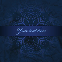Blue background with mandala and space for text. Vector template