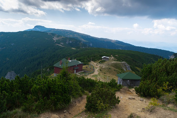 Fototapeta na wymiar Amazing panorama Ceahlau massif, Eastern Carpathians Mountains, Moldova, Romania