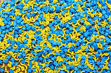 Sugar sprinkle stars, decoration for cake and bakery, a lot of sprinkles as a background