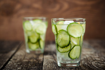 Detox water with cucumber and lemon .
