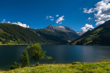 Naklejka na ściany i meble Amazing summer morning on the fantastic Speicher Durlassboden Lake, Alps, Austria, Europe