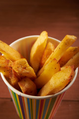 French fries in paper cup