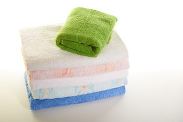 stack of towels on a white background