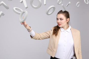 Woman working with binary code, concept of digital technology.