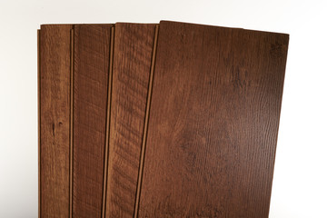 four laminate planks on a white background