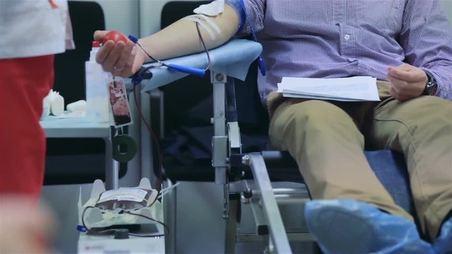 Man donor donates blood voluntarily