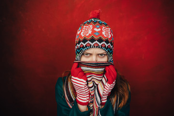 Woman in winter hat smiling
